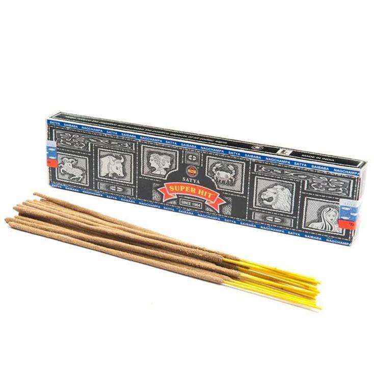Box of Satya Super Hit incense sticks with several sticks displayed in front of it.