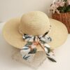 Straw Designer Hat with Pearls and Silk floral fabric Bow Trendy Beach Hats For Women; Adult One Size Fits Most (22-23 inches), adjustable size VTrendz